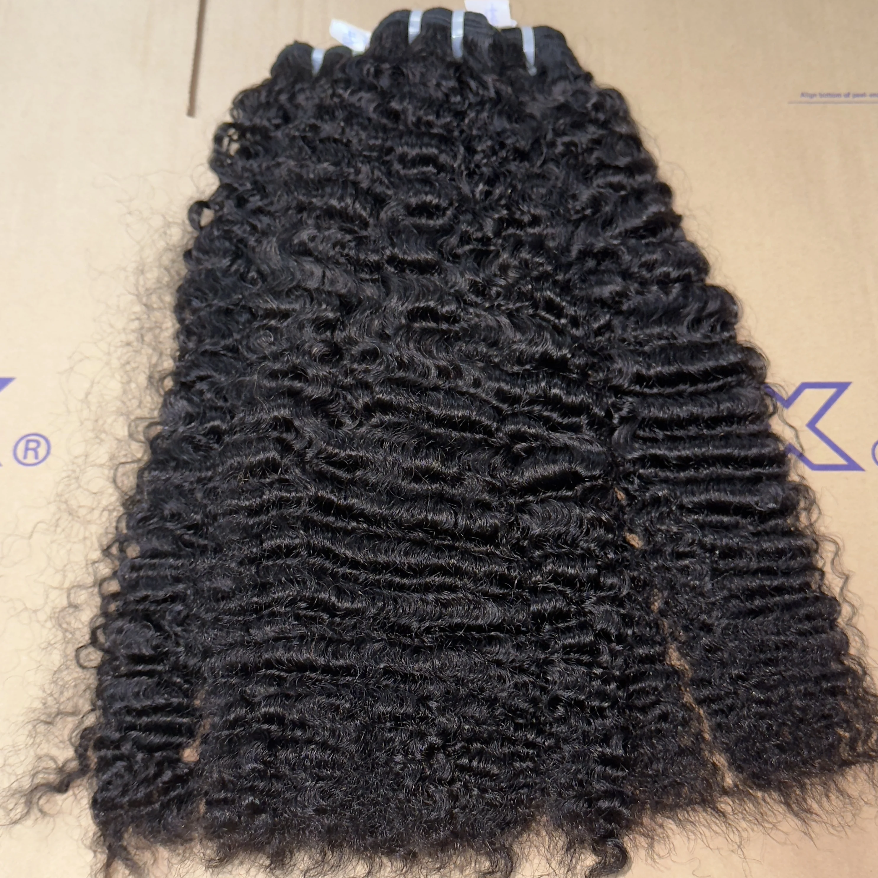 Hot selling curly hair bundles real human hair extensions raw hair vendor wholesale
