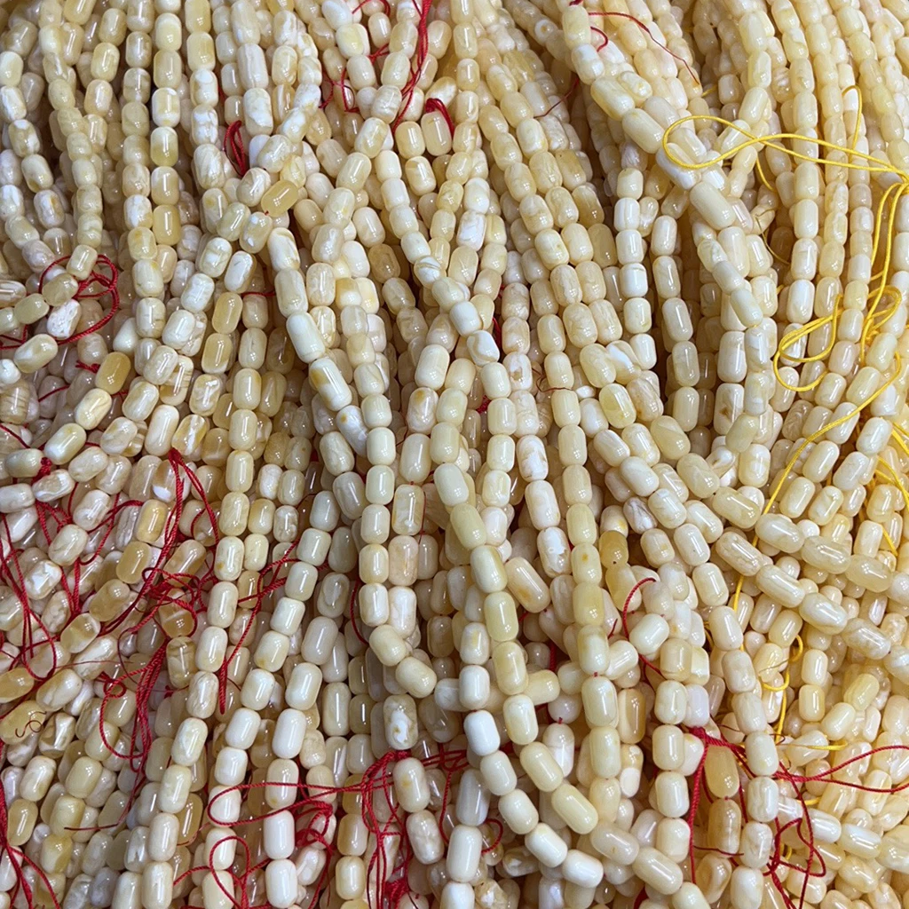 Natural Russian amber jewelry with high-quality white tiger skin and yellow pattern capsule shape 6-8mm Muslim prayer beads