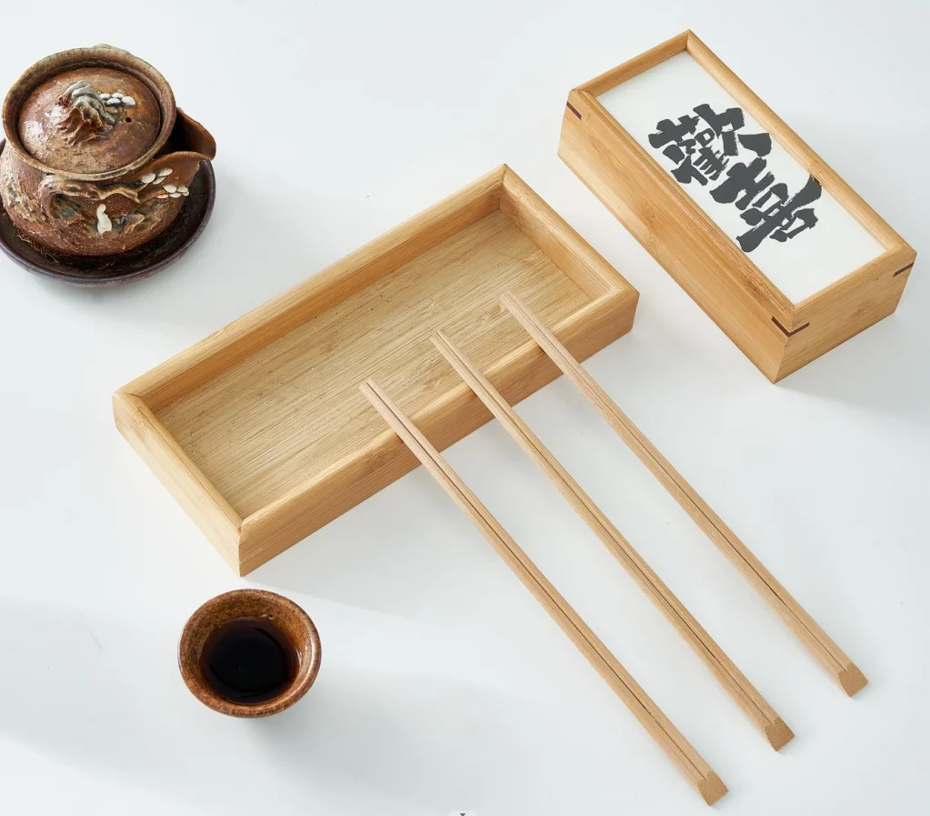 Одноразовые бамбуковые палочки для еды близнецов в голых бамбуковых палочках для суши