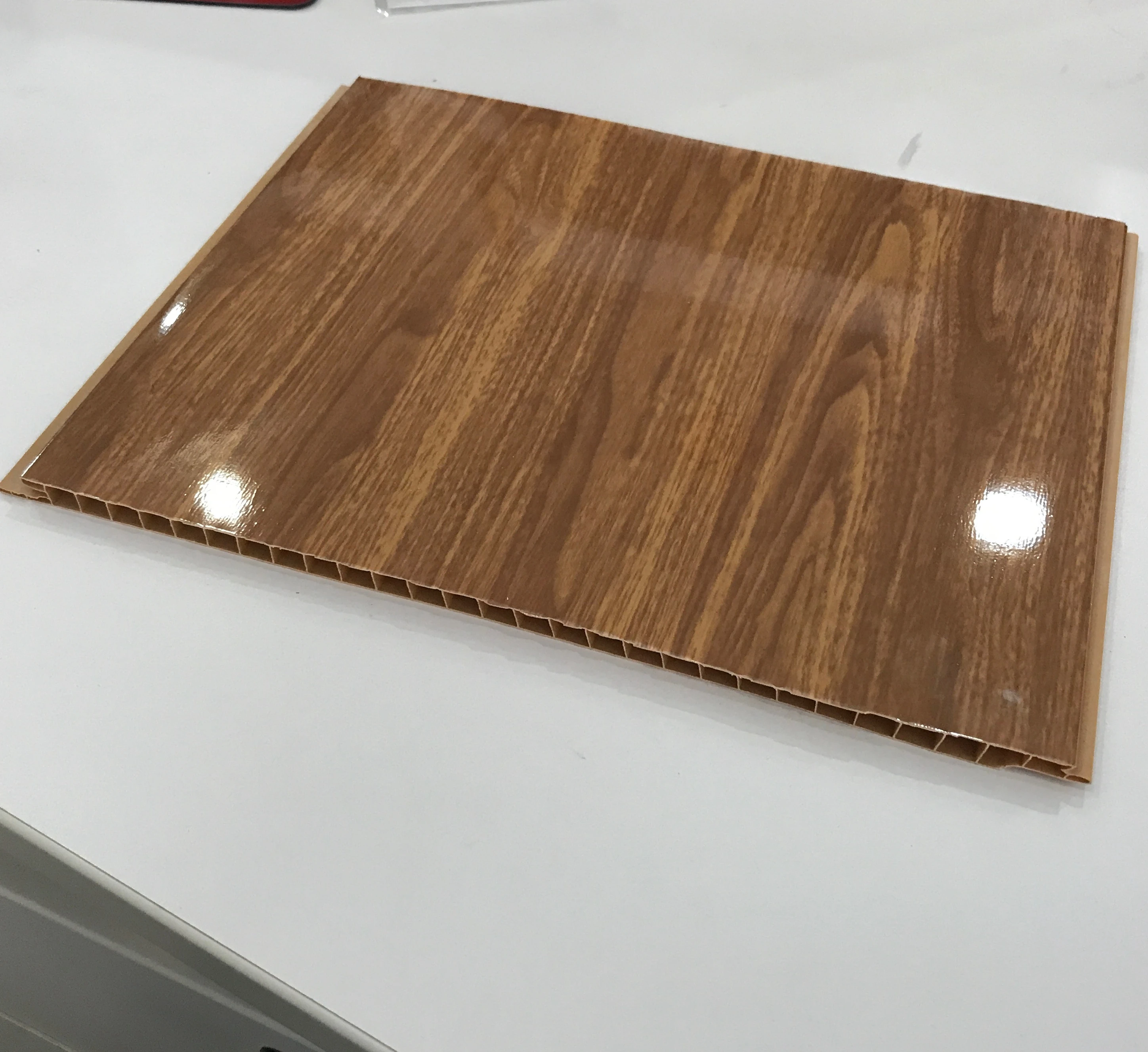 China Customized PVC Ceiling Panel Waterproof Ceiling in Woodgrain Design