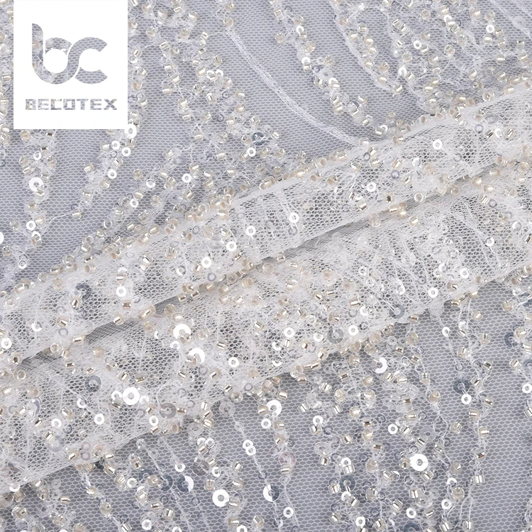 china wholesale white beaded embroidery sequin mesh lace fabric for women wedding dress
