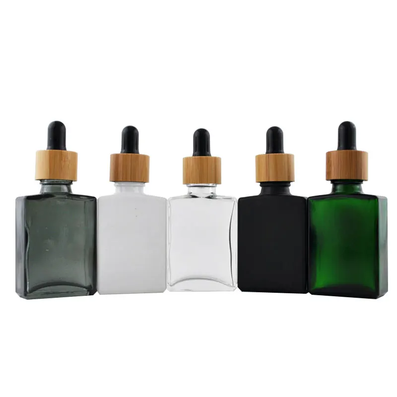 
Frosted Glass Rectangle Black White 30Ml Beard Oil Essential Oil Square Matte Glass Dropper Bottle With Bamboo Childproof Cap 