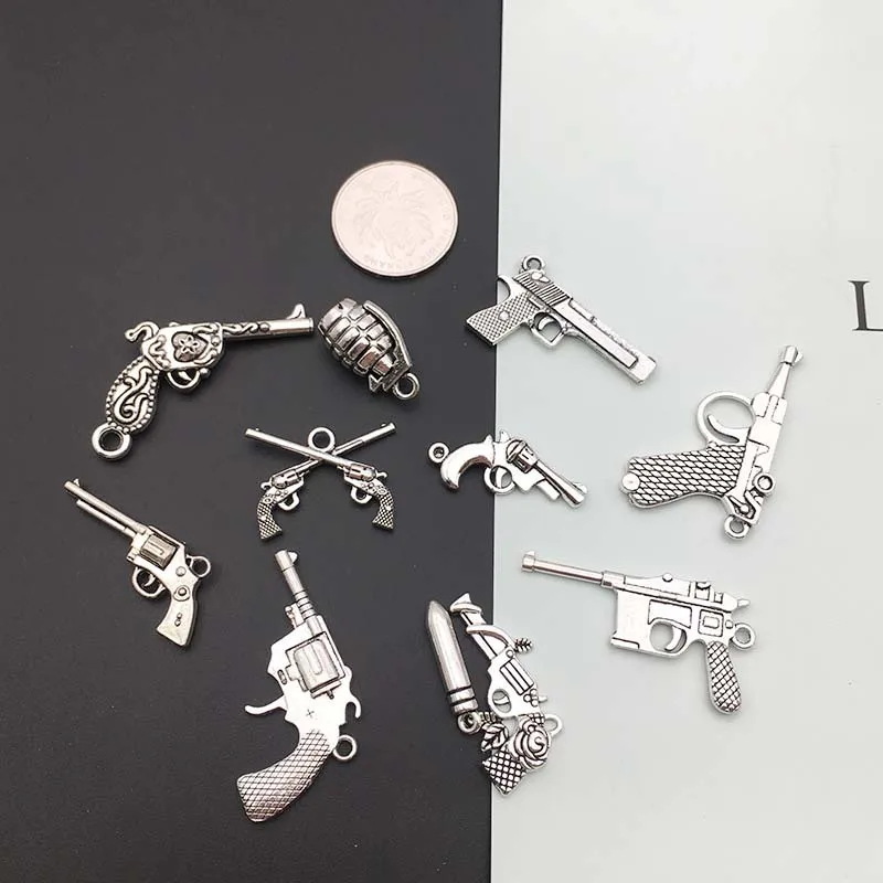 Manufacturers Wholesale DIY vintage alloy jewelry accessories silver guns weapons bullets necklaces bracelets pendants