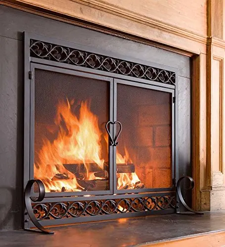 
Cast-iron framed fireplace screens combine with elegant design to keep two hinged doors securely closed 