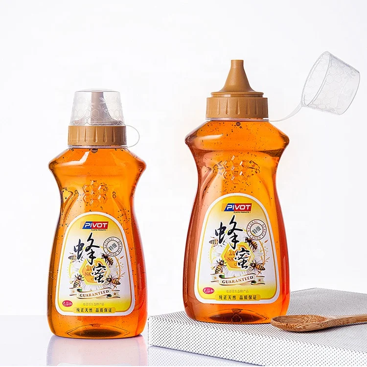 Factory wholesale 500g 800g 1000g PET empty honey container jars  honey packaging plastic bottle with tip cap