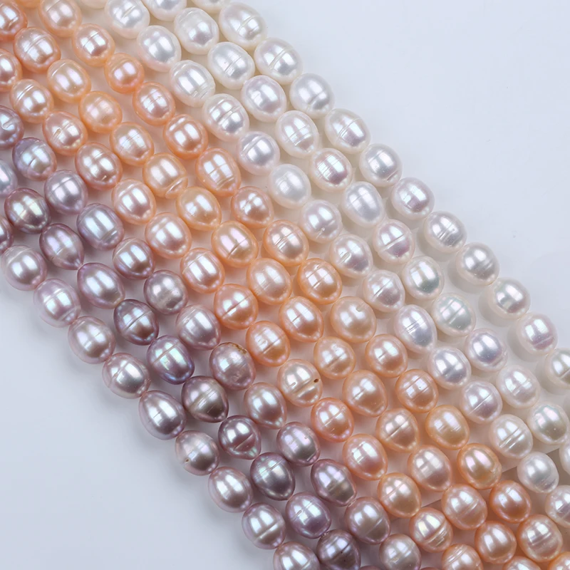 Wholesale 10-11mm Natural White Pink Purple  Big Size Rice Shape Freshwater Natural Pearl  Strands