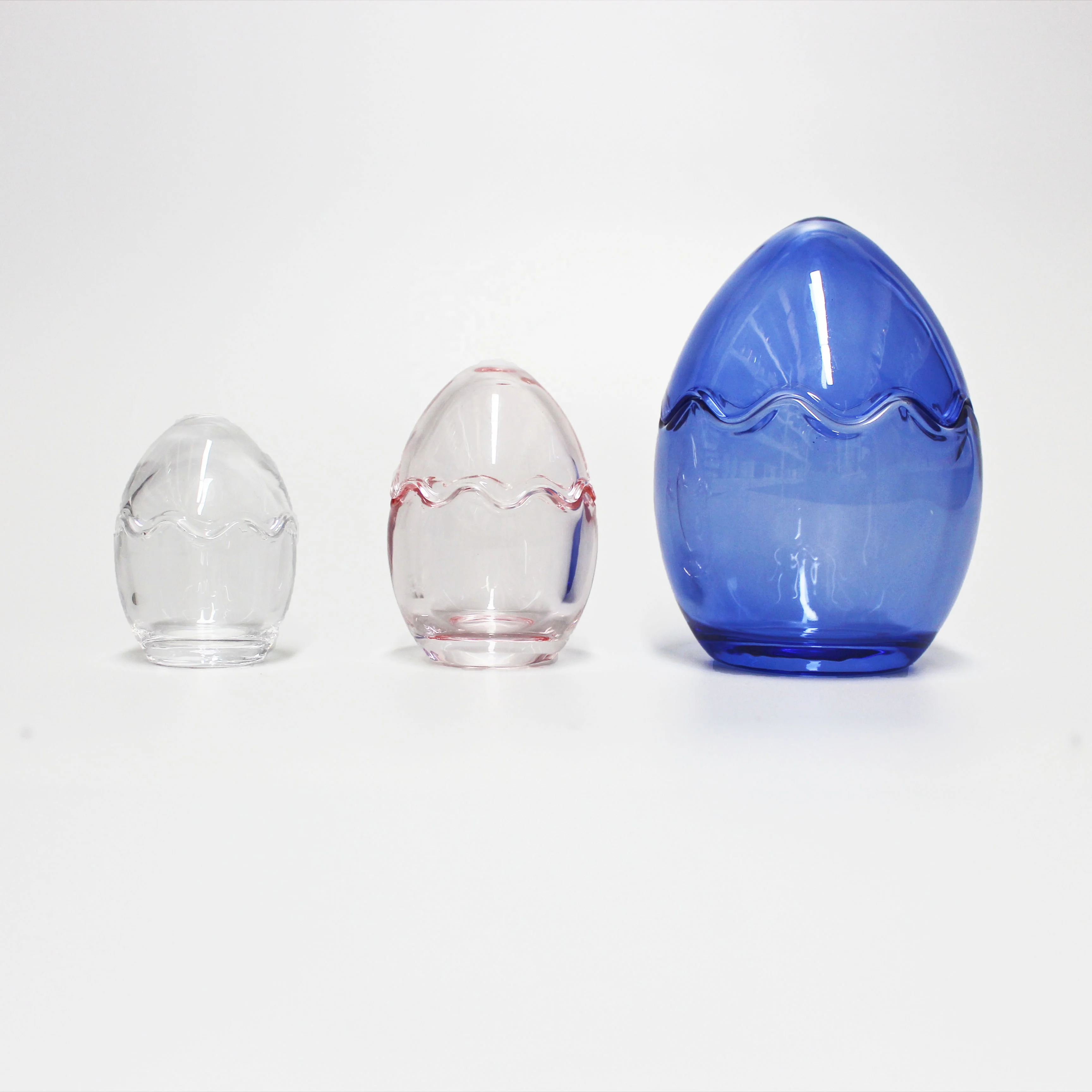 LANGXU  Unique design egg shape colored candle jars wholesale glass storage clear candy jar food storage & container with lids