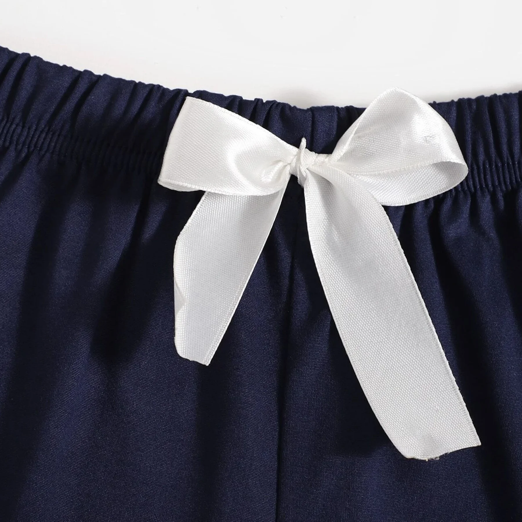 Wholesale Elastic Waist Ruffle Hem Bow Rayon Fabric Sleep Shorts, Women Short Bottoms