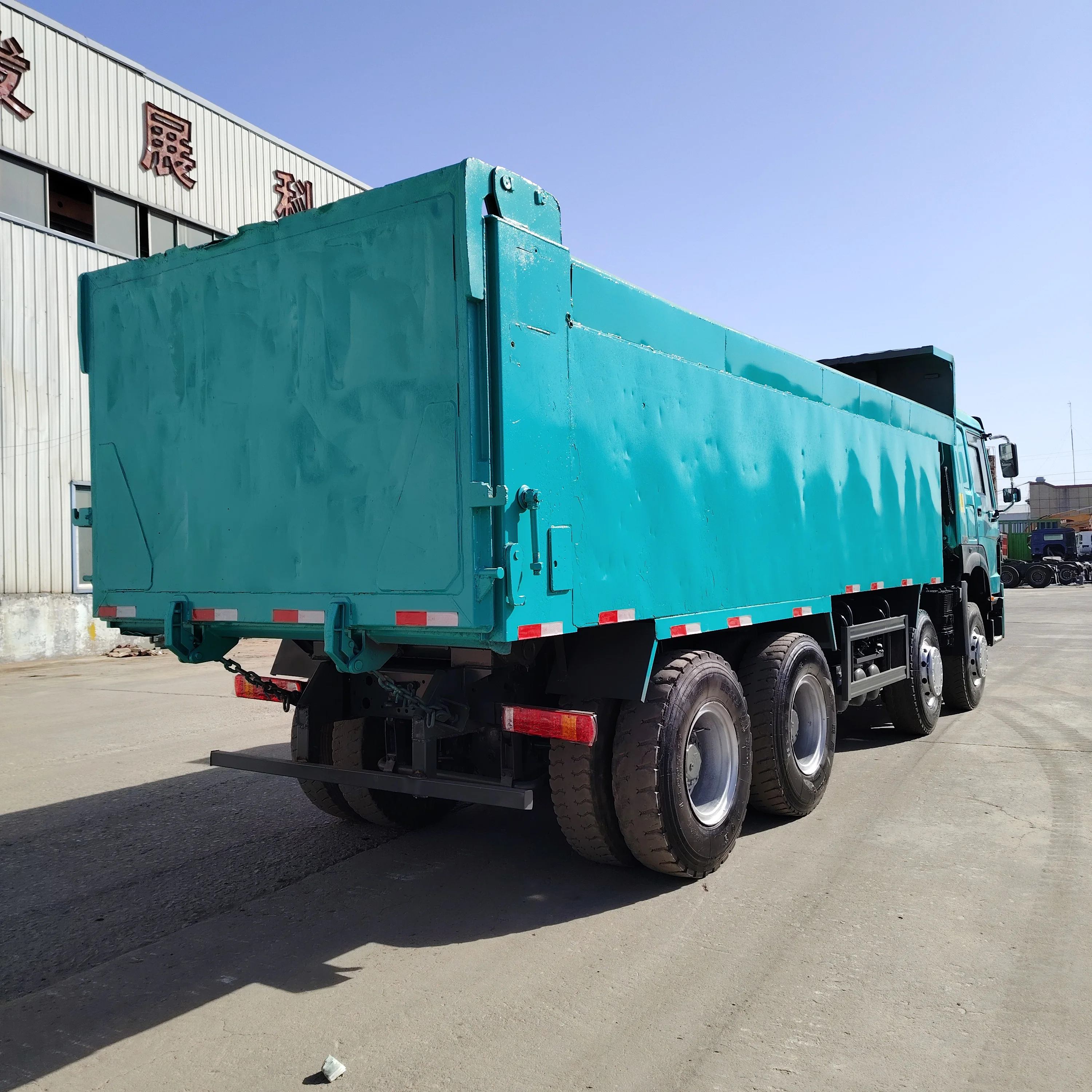 Heavy Duty SINTRUK 8x4 12 Wheels 371Hp/375Hp380Hp/420Hp Used HOWO Dumper Trucks With Container for Sale