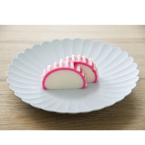 Japanese palatable low-calorie pastry sushi roll for New-Year dishes