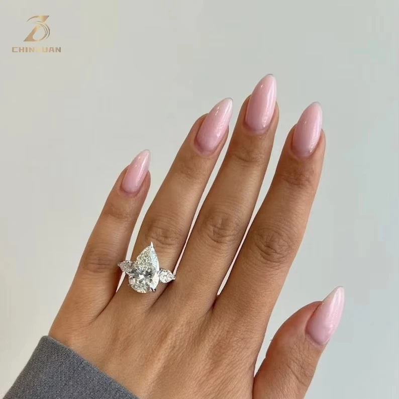 HUGE 7.00 Carat IGI Certified G Color VS1 Clarity Three Stone Pear Cut Lab Grown Diamond Ring