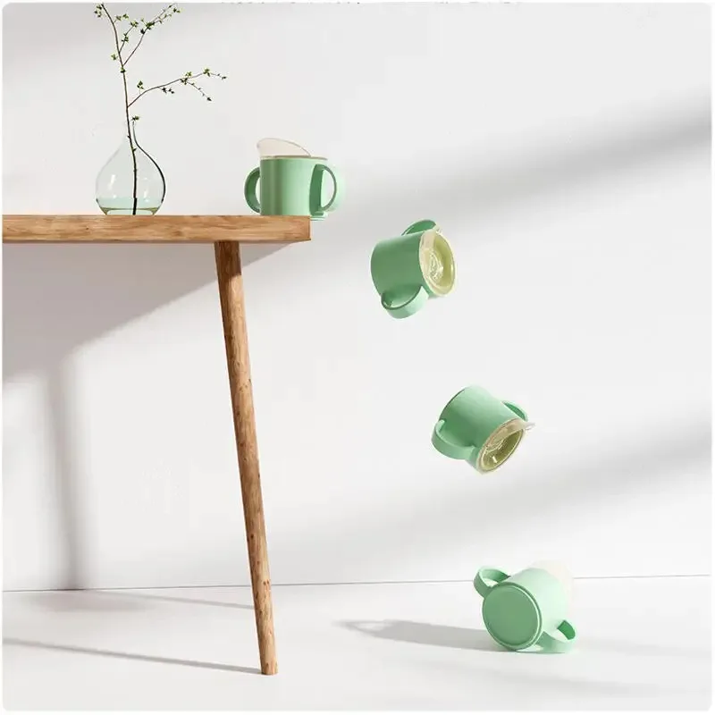 No-Spill Easy Grip Baby Travel Tumbler Cup BPA Free Drop-proof Kids Learning Sippy Cup Baby Trainer Mug With Handle And Lid