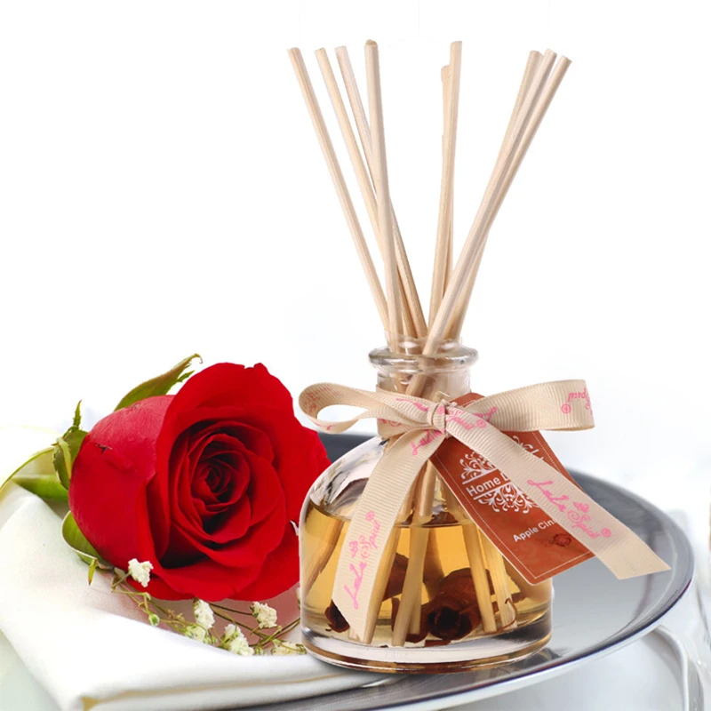 China supplier natural aroma essence oil  glass bottle reed diffusers with rose rattan stick wholesale