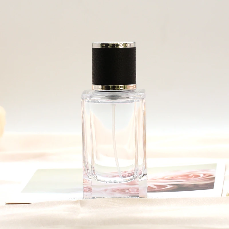 Hot Sale 50 ML Clear Cosmetic Packaging Fragrance Empty Square Glass Home Perfume Bottles With Pump Spray