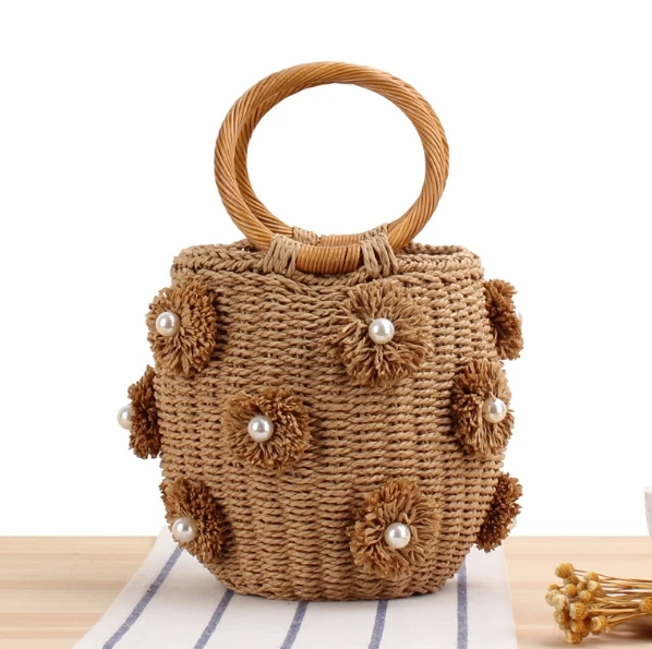 2024 new hand-held straw braided bag Japanese and Korean bucket braided bag hand-braided flower pearl beach women bag