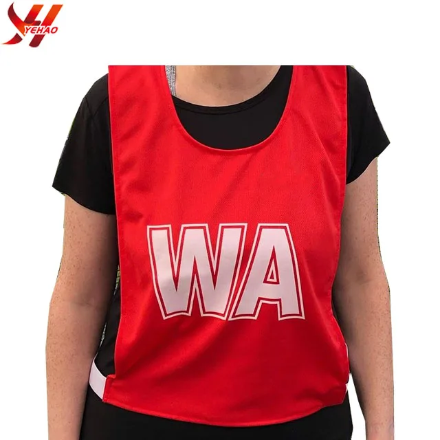 Multicolor netball bibs with sublimated numbers