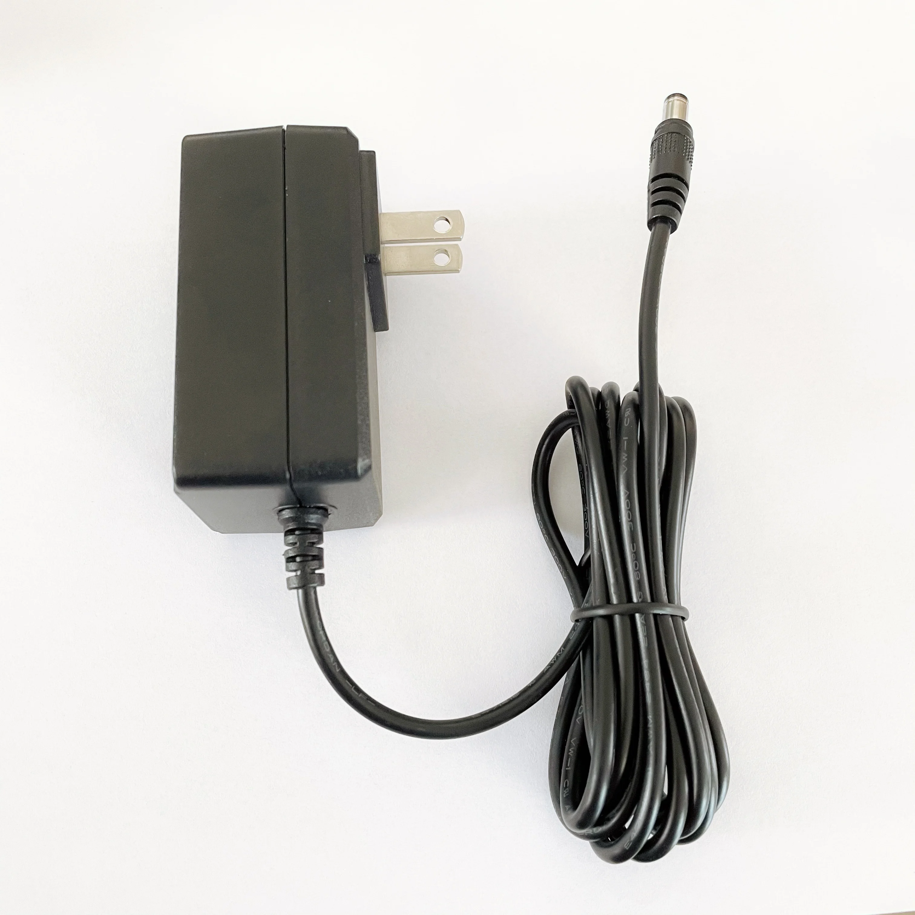 Hot sell plug in  the US  AC DC 12v 2a power supply  220v ac to 4.2v 5v 6v 8.4v 12v 24v 0.5A 1a 2a dc power adapter for led desk