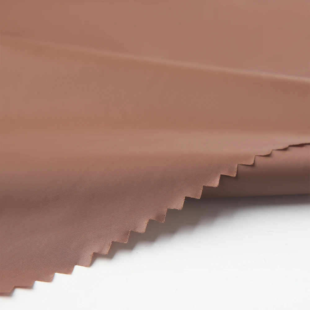 100% Nylon Light Weight 380T 400T 420T Taffeta Fabric Raw Material Textile Fabrics For Clothing Garment Down Jacket