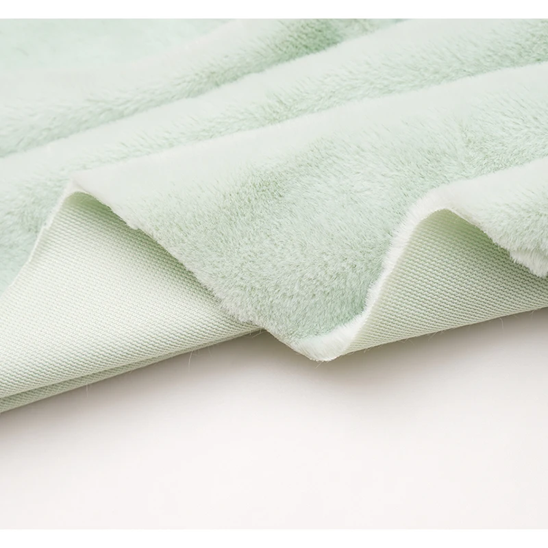 Chinese Factory Faux Rabbit Fur Fabric Eco-friendly Spun Yarn Long Pile Faux Fur Fabric Fluffy Imitation Rabbit Fur