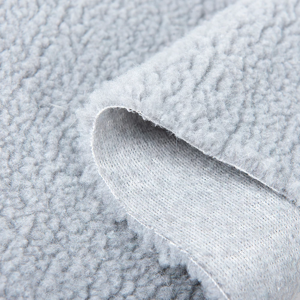 Wholesale 100% polyester sherpa lamb borg wool plain plush fabric comfortable and warm, suitable for garment