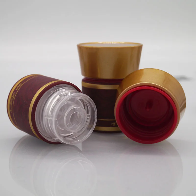 Non refillable spirits vodka gin bottle aluminum plastic caps guala safety capsules tamper evident snap on cap lids screw caps