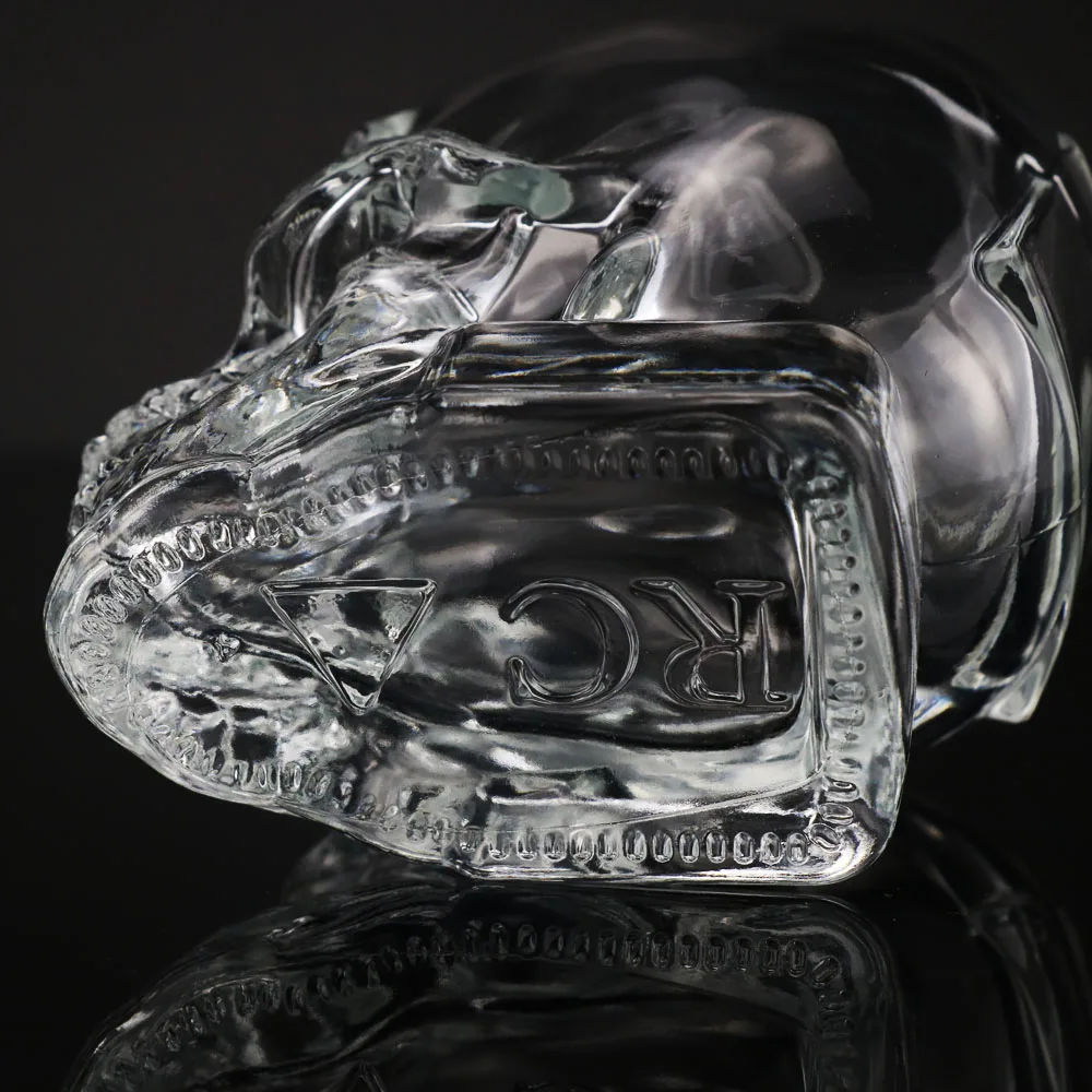 Unique Design Empty 15ml 30ml 100ml Skull Glass Perfume Diffuser Bottle With Spray Cap