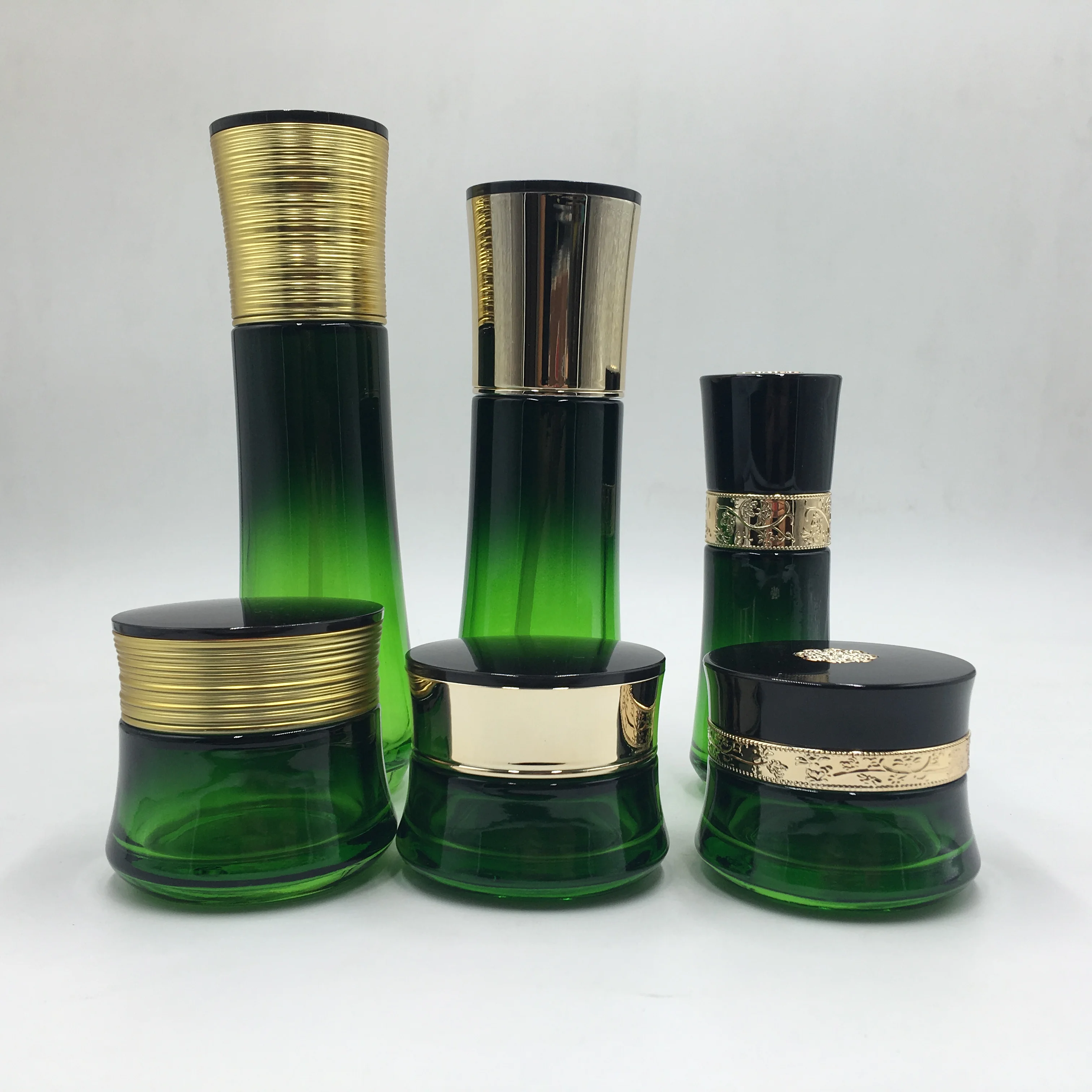Luxury packaging transparent empty cosmetic sets glass bottle with pump