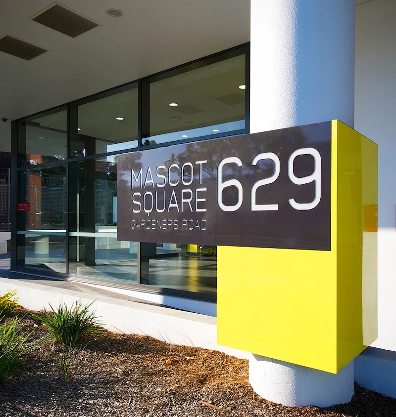 hotel building wayfinding system design coppery embossment direction sign hotel room numbers