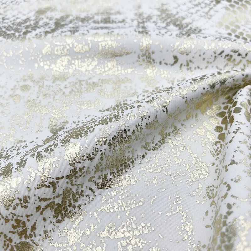 Custom high quality polyester spandex knit elastic snake gold foil print tracksuiting fabric