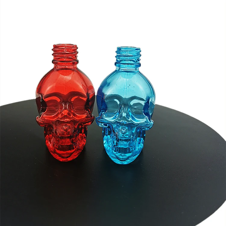 Multi-function empty aliens dropper essential oil bottle perfume liquor container with cap