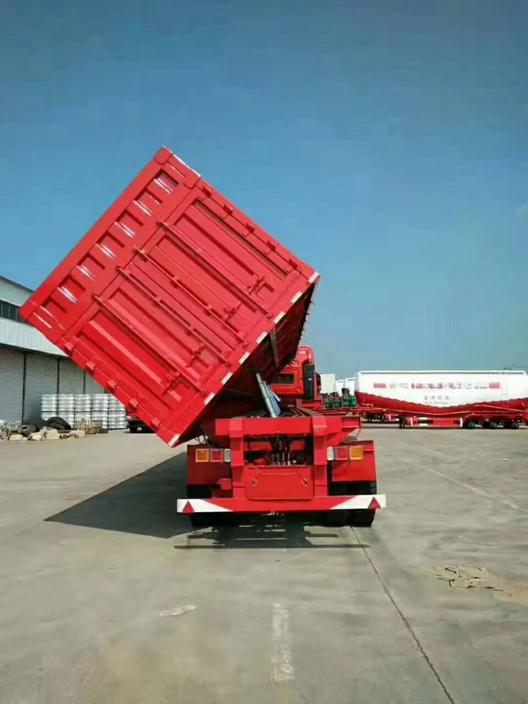 China Semi Side Dump 3axle 60 T Side Drop Tipper Semi Trailer For Sale