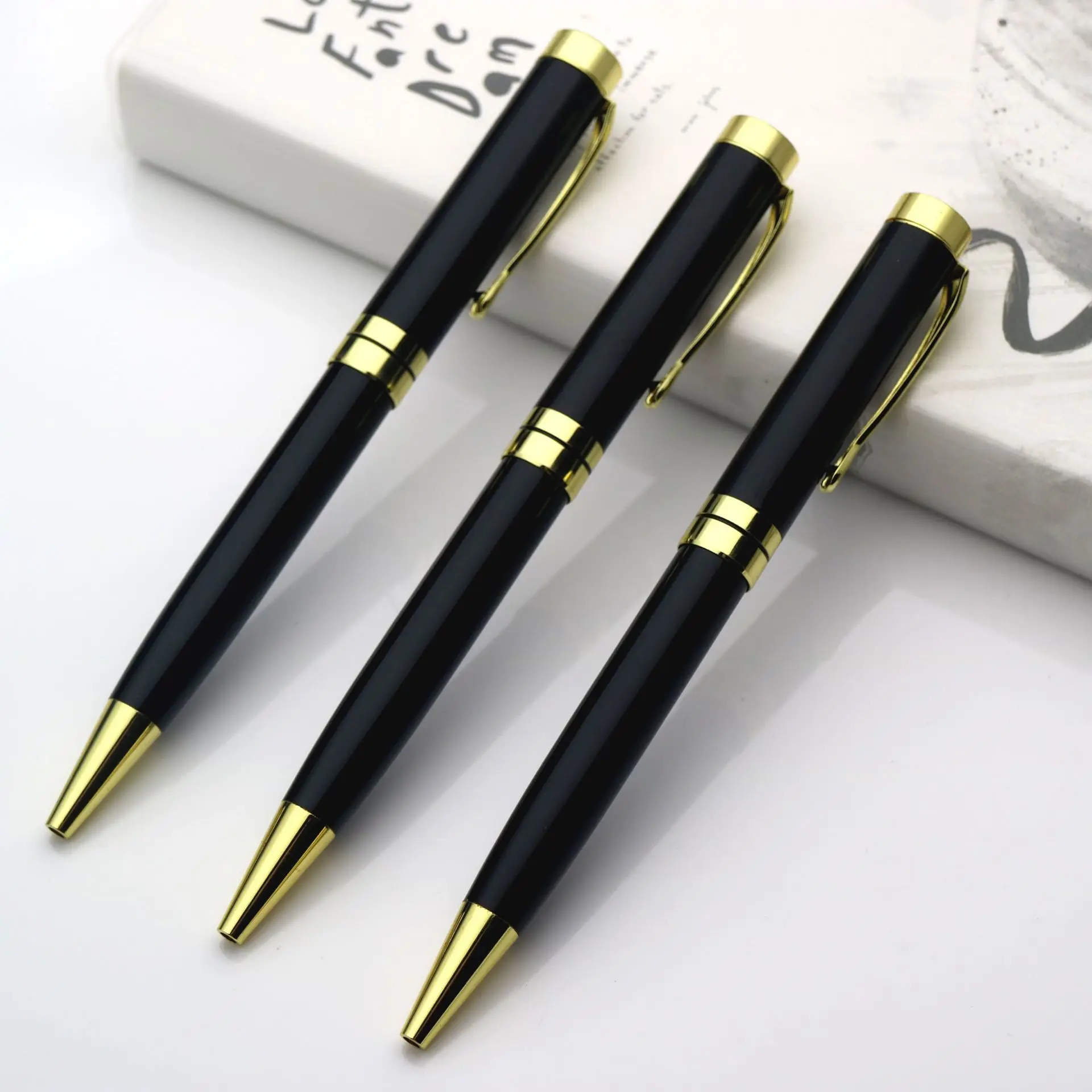 2023 wholesale Metal rotating ballpoint pen Smooth signature pen Gift stationery with laser LOGO