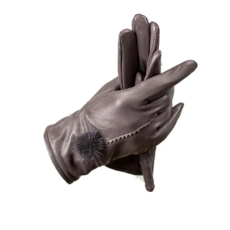 Wholesale mink fur ball leather gloves women plus velvet thickened sheepskin gloves