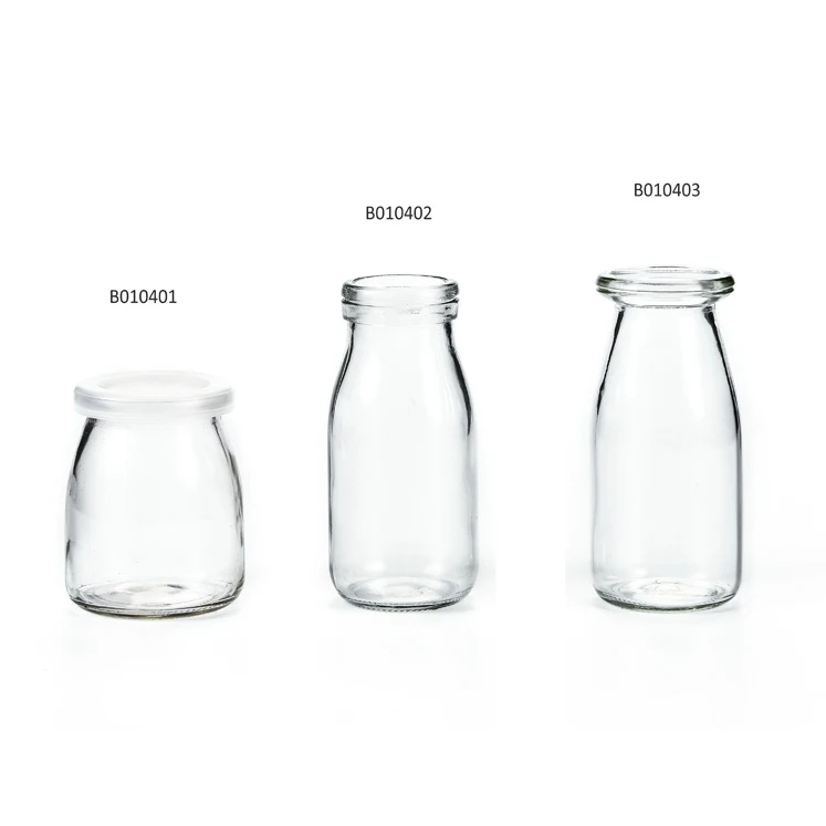 Wholesale price custom logo transparent glass milk bottles of various sizes 200ml 250ml 500ml 1000ml 6oz 8oz 16oz 32oz