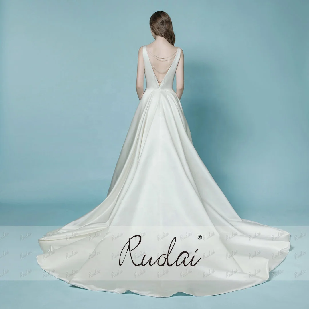 Ruolai QD06001 Simple Crystal Tassel Decoration Bride Dress with pockets Open V back Folded Satin wedding dresses