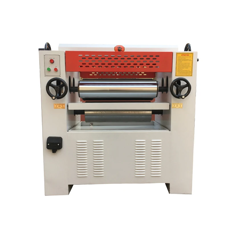 Wood panel veneer gluing machine and glue spreader machine
