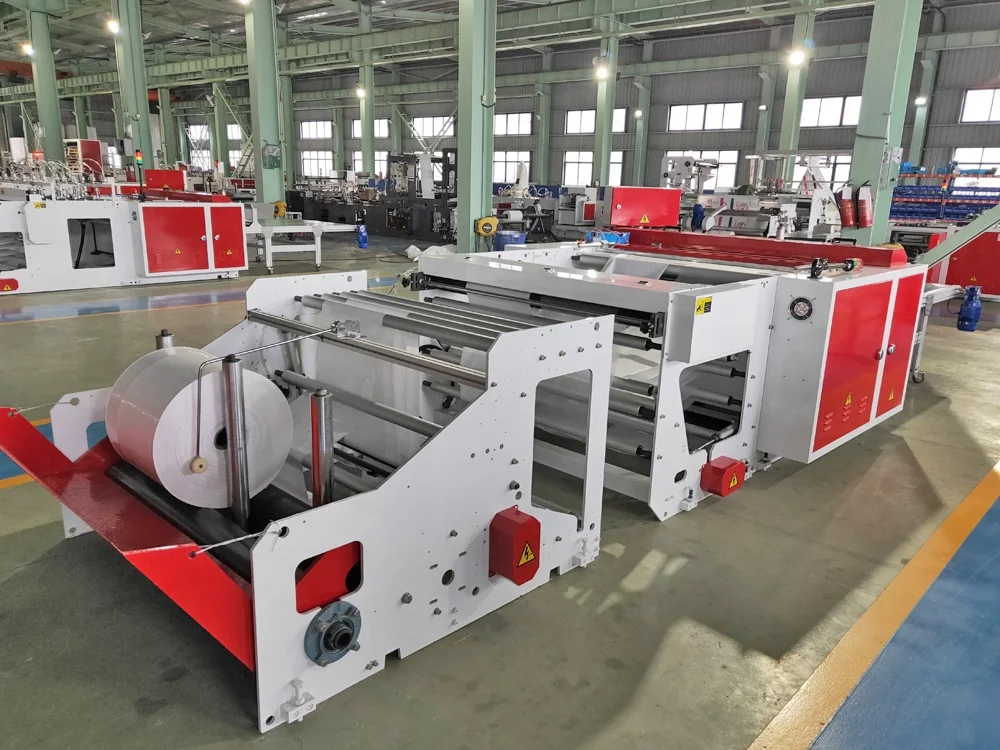 
fully automatic heavy duty flying knife cutting bottom sealing bag making machine price 