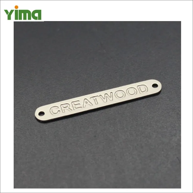 China maker custom metal logo tag badge with PU label metallic label logo for handbags and clothing