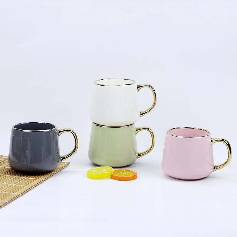 High quality Nordic design new bone china  embossed ball cup color glaze series golden rim and handle  coffee mug