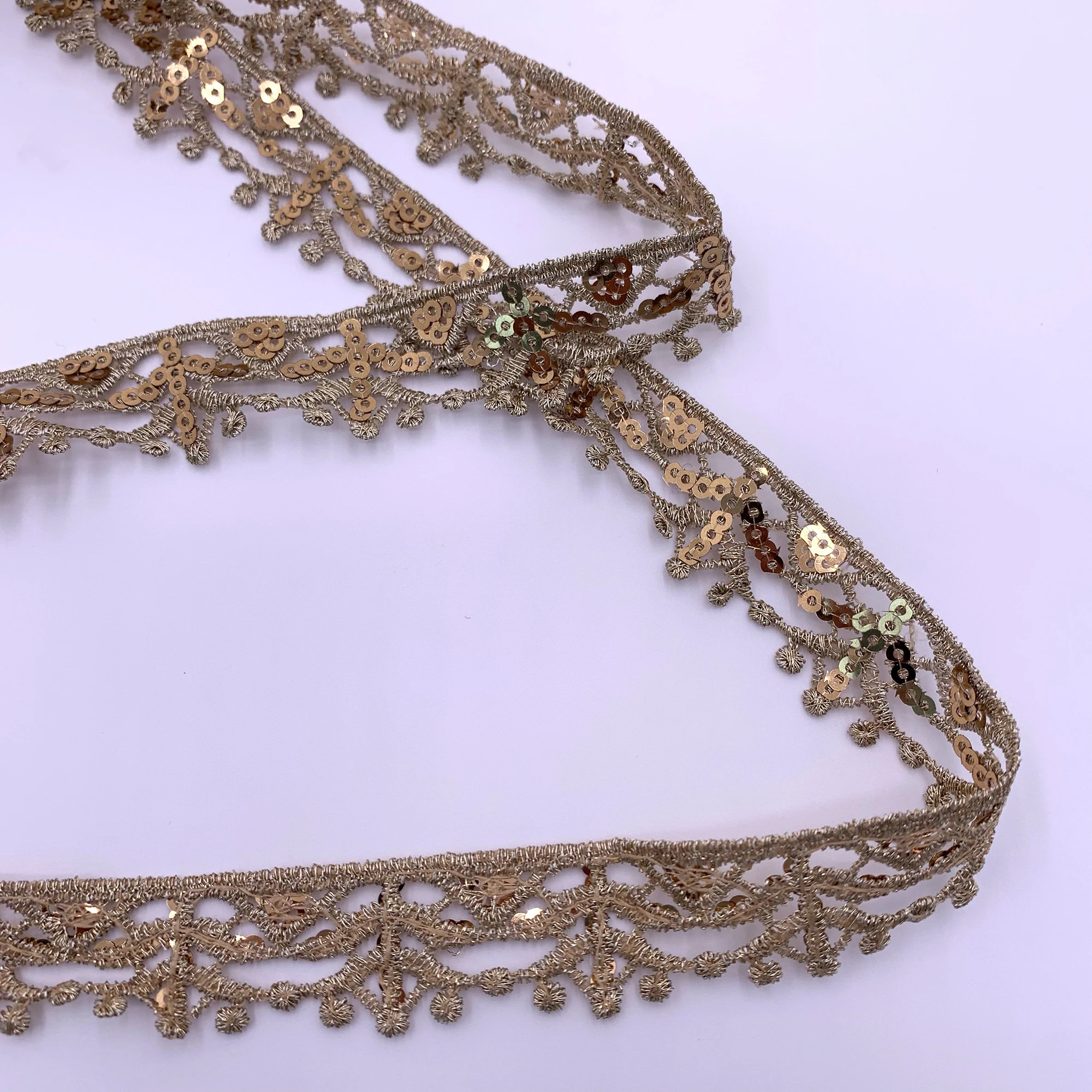 High Quality Wholesale Shiny Polyester Water Soluble Delicate Sequin Gpo Lace Trim Gold