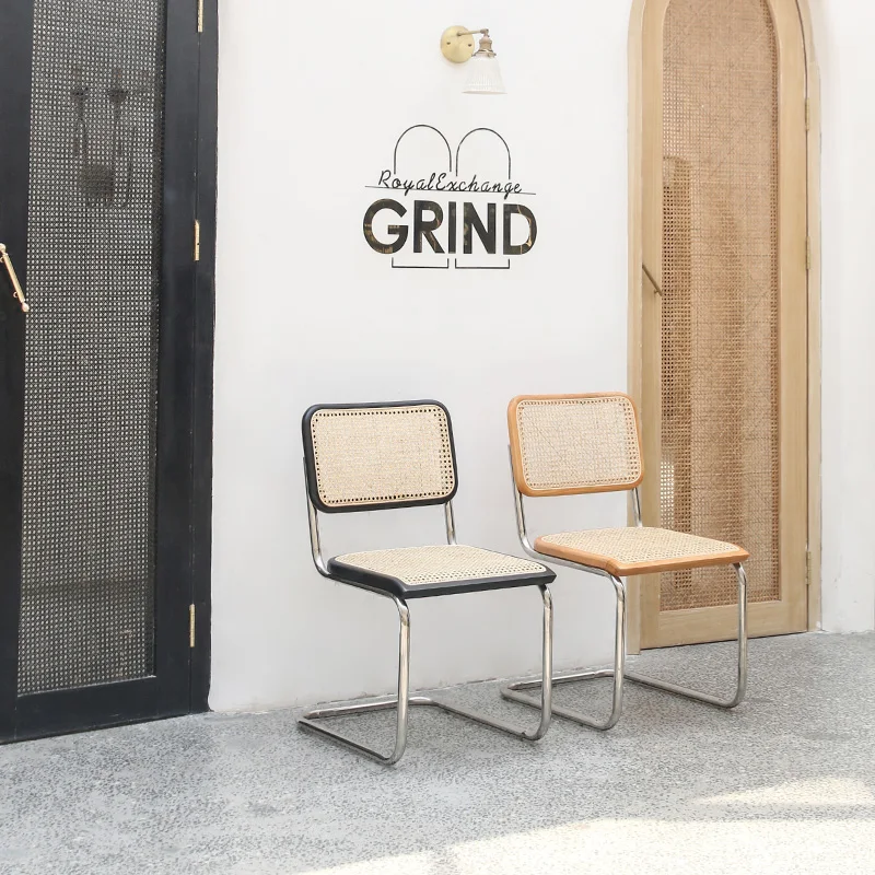 Modern designer vintage medieval luxury leather rattan dining chair stainless steel frame for dining room restaurant cafe