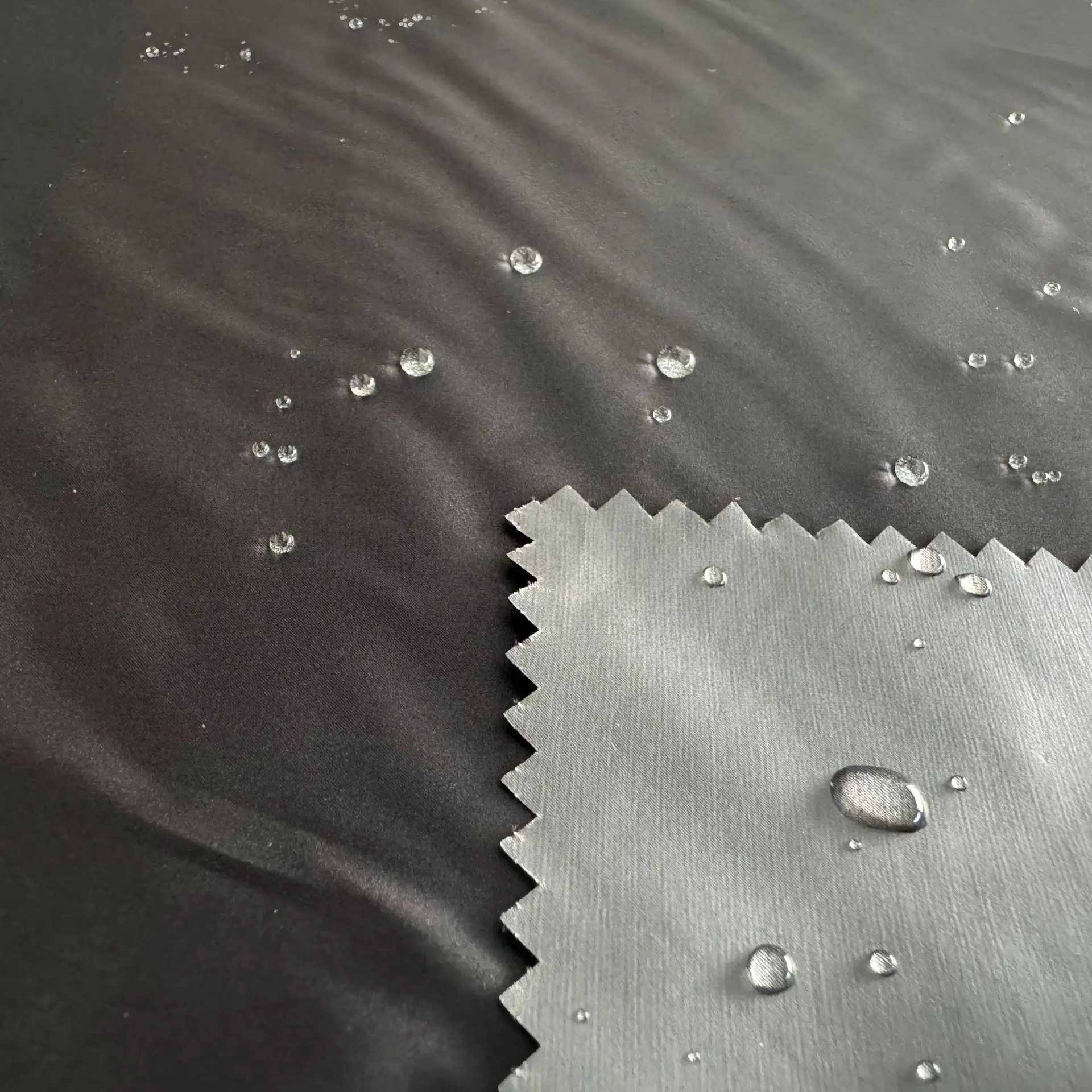 High density cotton Pongee 15D 25D 30D satin fashion down jacket fabric three anti-ironing film no bile anti-velvet