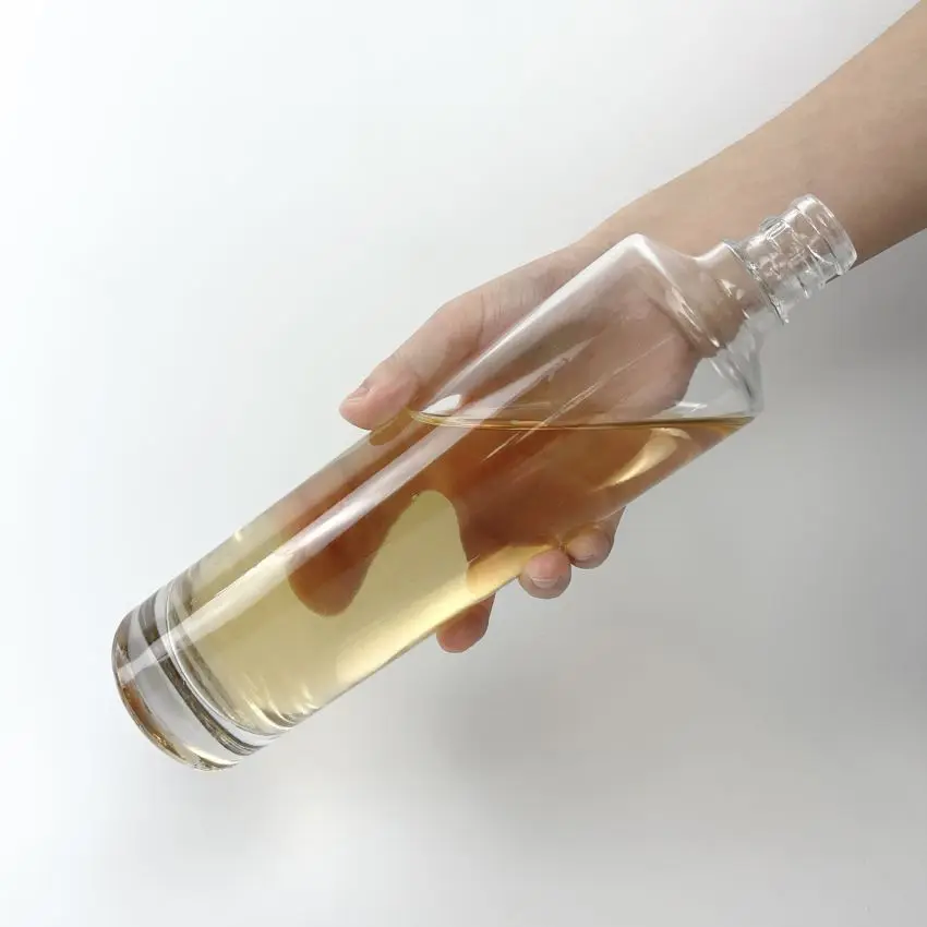 Long clear cylindrical glass alcohol bottle with thick bottom 500 ml