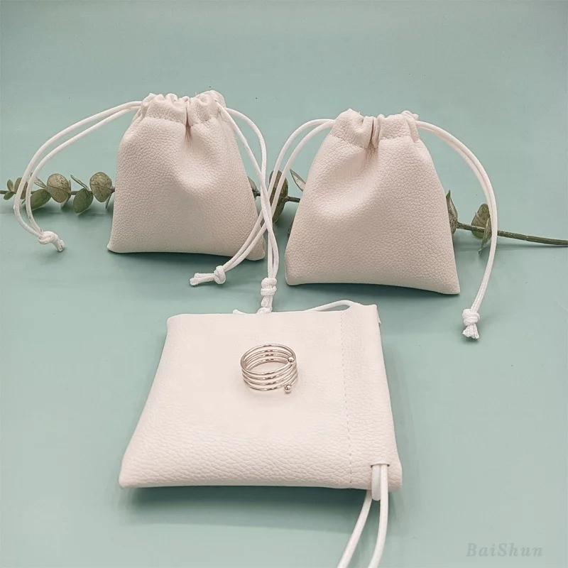 Hot Sale Custom Logo Emboss Pink Pu Leather Drawstring Bag Sunglasses Power Bank Waterproof Leather Pouch