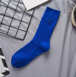HEHE Custom Cotton Logo Autumn and Winter crew socks pure fluorescent color socks for women with embroidery smiley face patterns