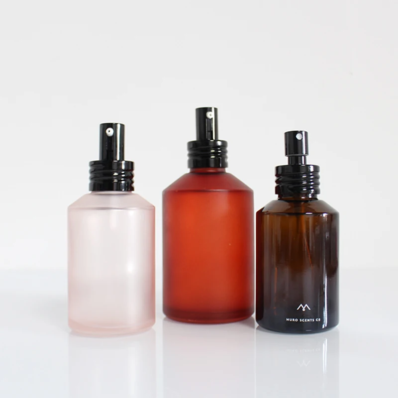 Empty 2 oz and 4 ounce 100ml 120ml matte clear amber glass spray bottle with shinny golden Fine Mist Sprayer