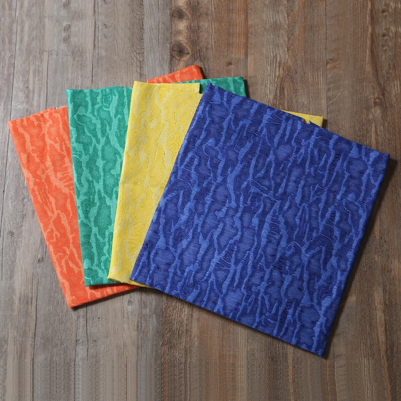 Orange camo  3D three-dimensional scraping embossed printed polyester canvas fabric bright camouflage canvas handbag fabric