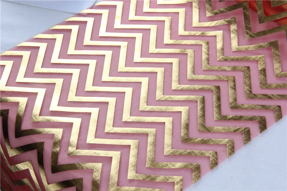 
Nylon organza table runner with bronzed design 