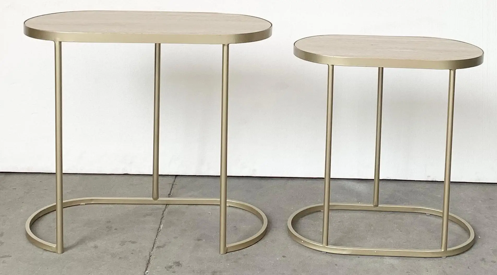Modern set of 2  pill metal nesting side table with travertine paper top