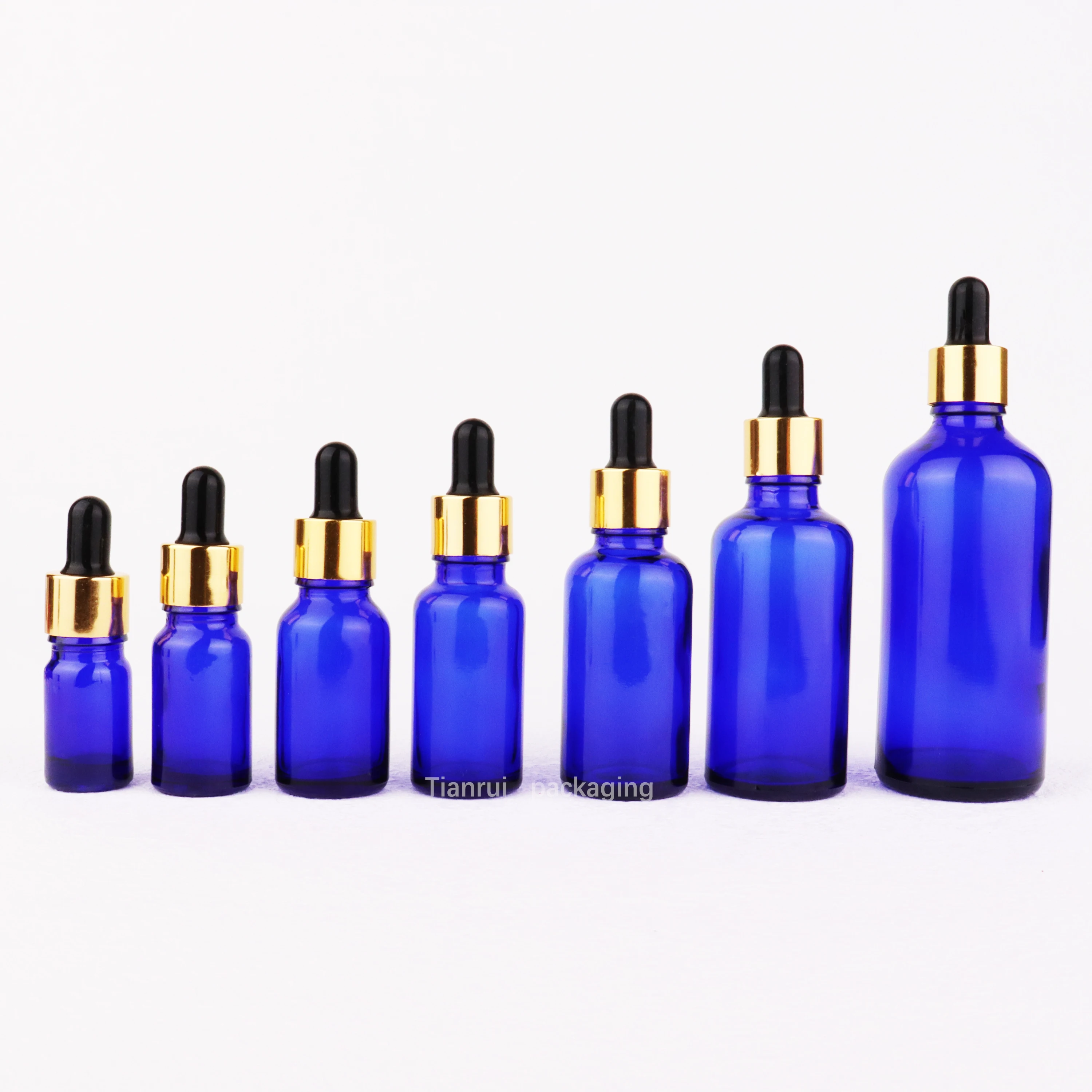 Low MOQ Essential Oil Product Container Colored Glass Dropper Bottles 5 10 15 20 30 50 100ml 2 oz Blue Serum Bottles